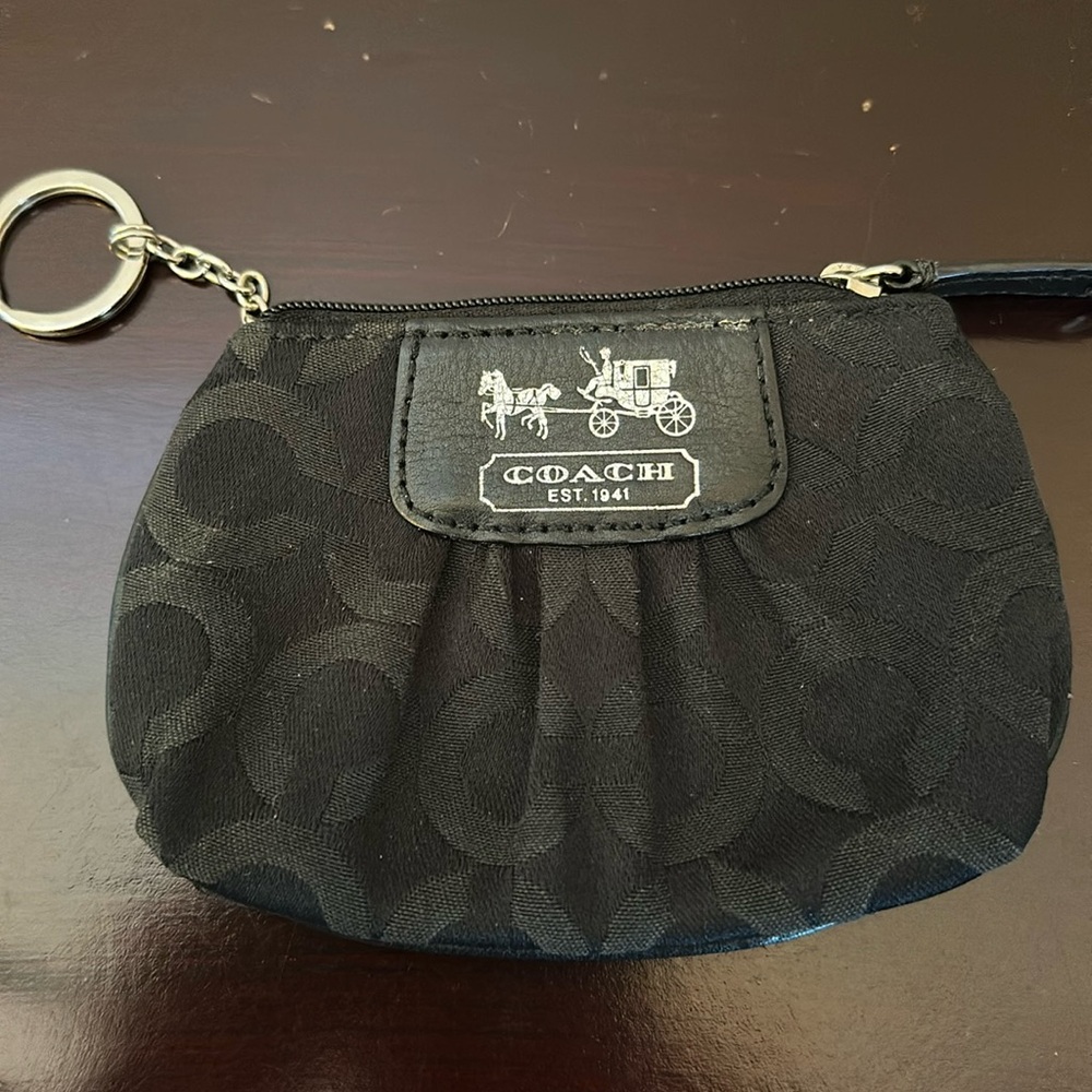 Coach black zip up little key purse. Good condition